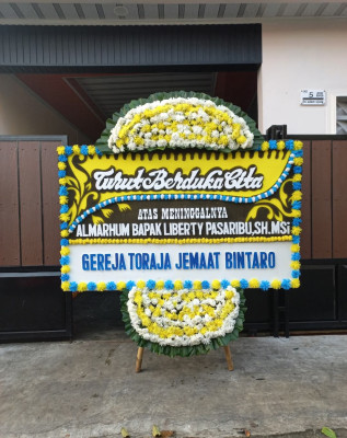 Papan Bunga Duka di Poga